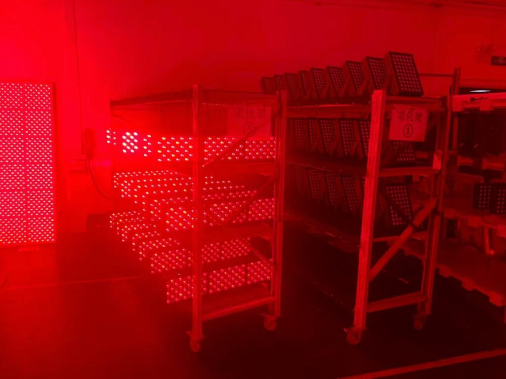 Red light therapy panels undergoing pre-shipment aging testing at the Temilo factory